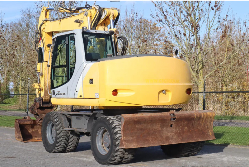 New Holland MH CITY | TILT BUCKET | QUICK COUPLER | DOZER BLADE - 轮式挖掘机:图3 New Holland MH CITY | TILT BUCKET | QUICK COUPLER | DOZER BLADE - 轮式挖掘机:图3