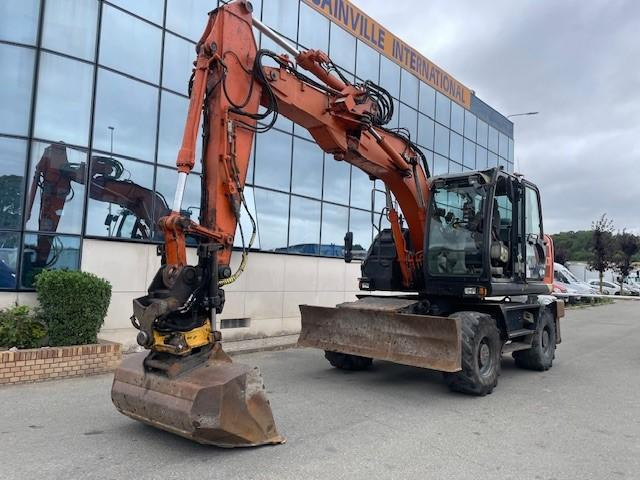Hitachi ZX140W-5B - 轮式挖掘机:图1 Hitachi ZX140W-5B - 轮式挖掘机:图1