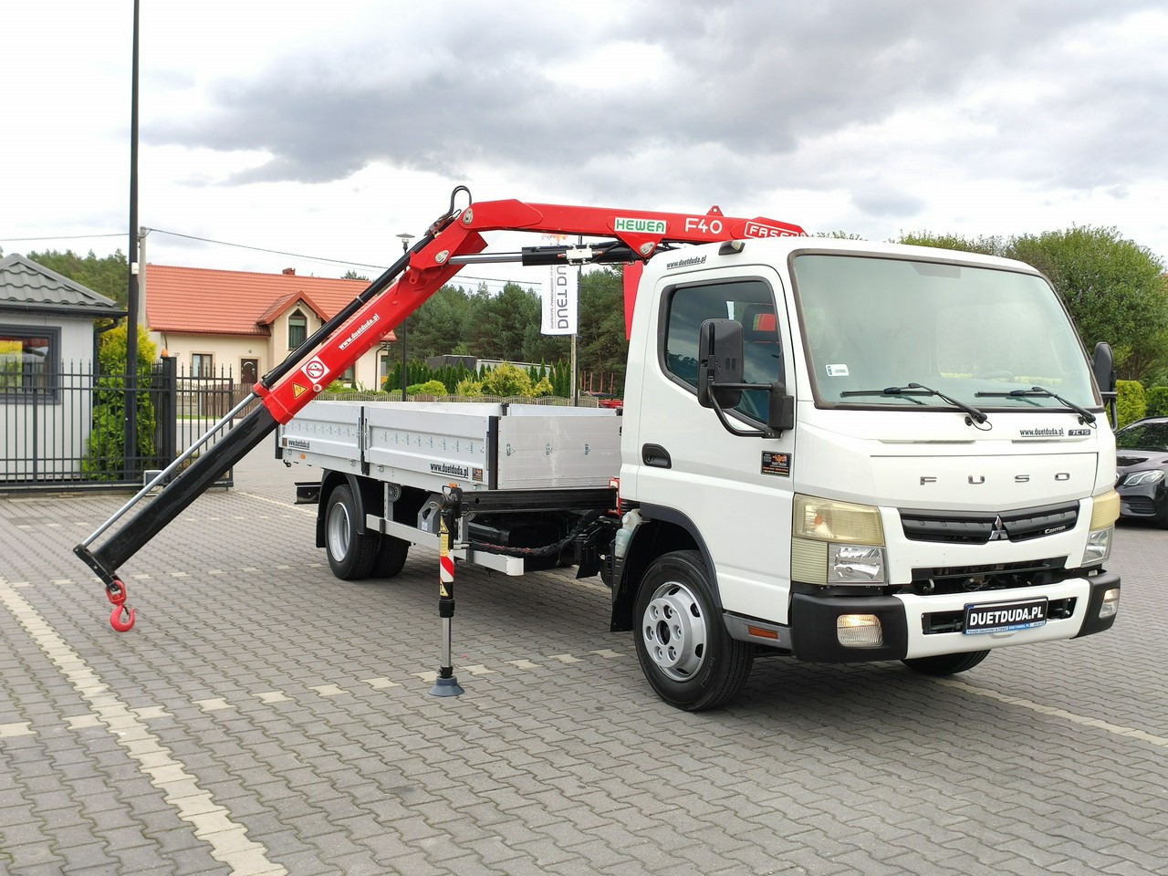 Mitsubishi Canter Fuso 7C15 3.0/150KM HDS FASSI F40 UNIKAT Super Stan !!! - 栏板式/ 平板卡车, 起重车:图1 Mitsubishi Canter Fuso 7C15 3.0/150KM HDS FASSI F40 UNIKAT Super Stan !!! - 栏板式/ 平板卡车, 起重车:图1