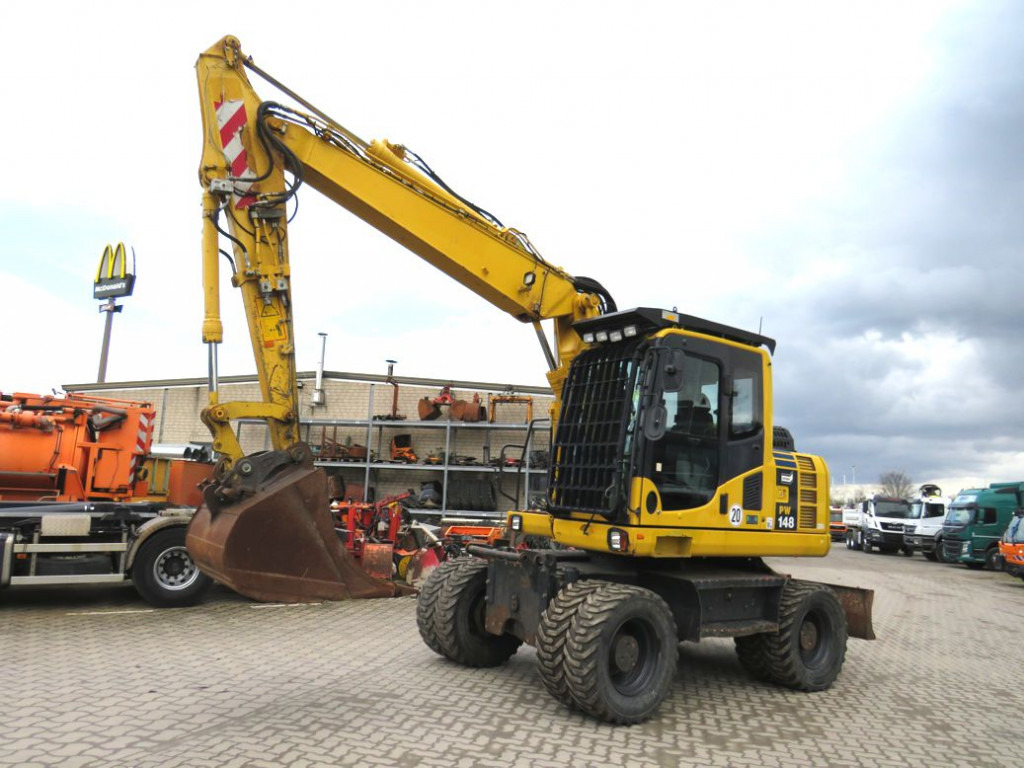 KOMATSU HANOMAG Mobilbagger PW 148 - 8 Bagger 6.824h Deutsch top - 轮式挖掘机:图1 KOMATSU HANOMAG Mobilbagger PW 148 - 8 Bagger 6.824h Deutsch top - 轮式挖掘机:图1