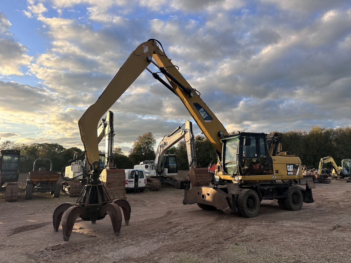 CATERPILLAR M 318 MH mit Greifer Kein 3022 3026 320 322 - 轮式挖掘机:图1 CATERPILLAR M 318 MH mit Greifer Kein 3022 3026 320 322 - 轮式挖掘机:图1