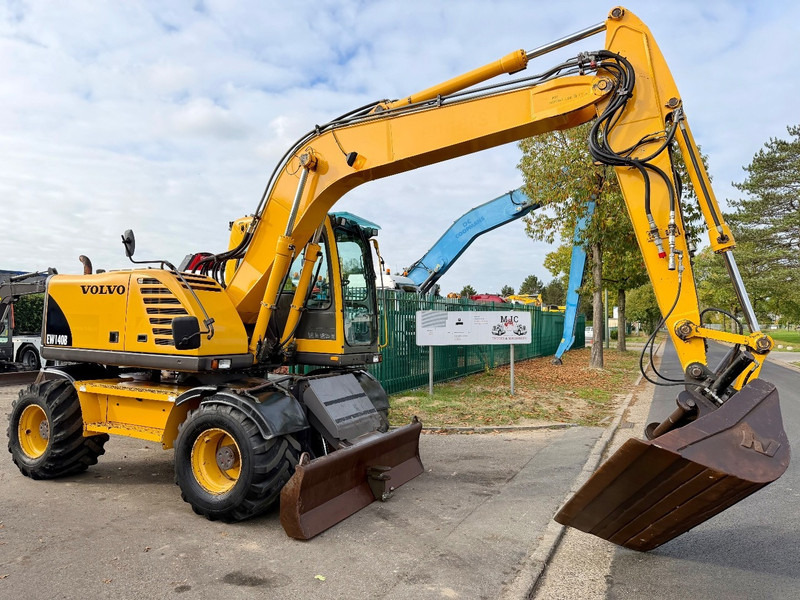 Volvo EW 140 B *FULL HYDR* - BLADE - 10.485h - TILT BUCKET - CE - NL MACHINE - GOOD CONDITION - 轮式挖掘机:图1 Volvo EW 140 B *FULL HYDR* - BLADE - 10.485h - TILT BUCKET - CE - NL MACHINE - GOOD CONDITION - 轮式挖掘机:图1