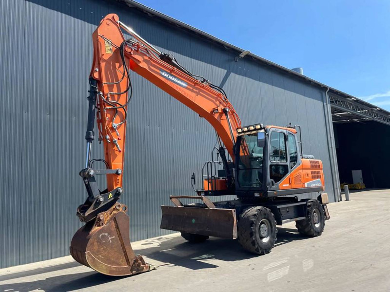 Doosan DX170W-5 - 轮式挖掘机:图1 Doosan DX170W-5 - 轮式挖掘机:图1