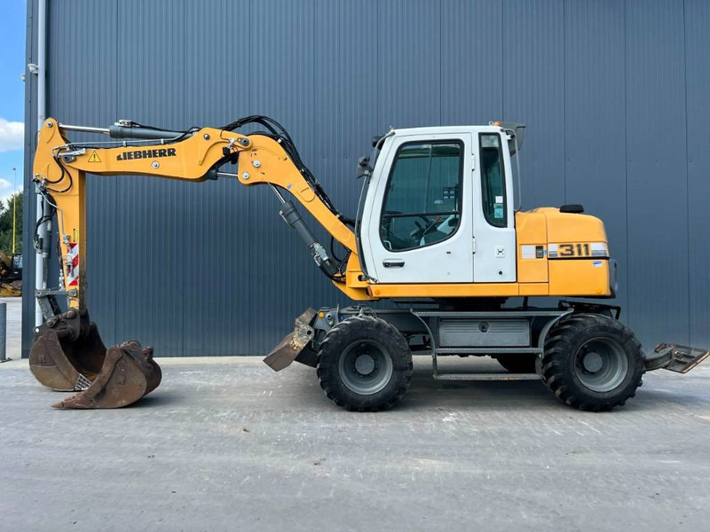 Liebherr A311 Litronic - 轮式挖掘机:图5 Liebherr A311 Litronic - 轮式挖掘机:图5