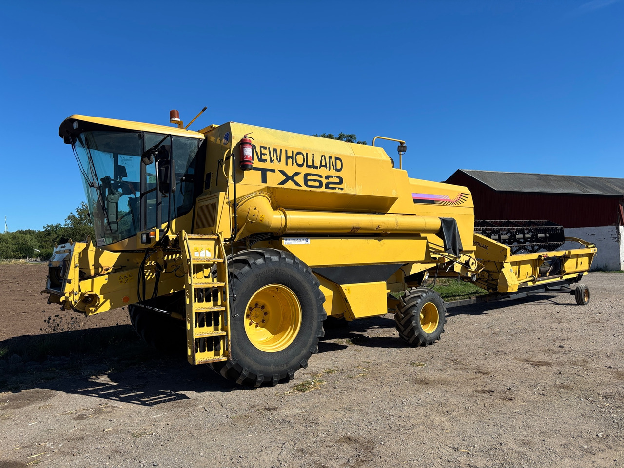 New Holland TX62 - 联合收割机:图1 New Holland TX62 - 联合收割机:图1