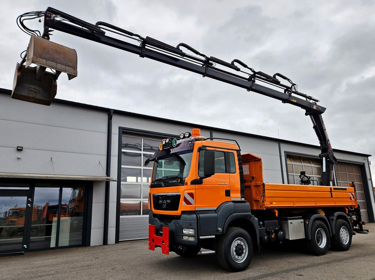 MAN TGS 28.360 6x4-4 HIAB 144E-4 Kran Euro5 - 翻斗车, 起重车:图1 MAN TGS 28.360 6x4-4 HIAB 144E-4 Kran Euro5 - 翻斗车, 起重车:图1