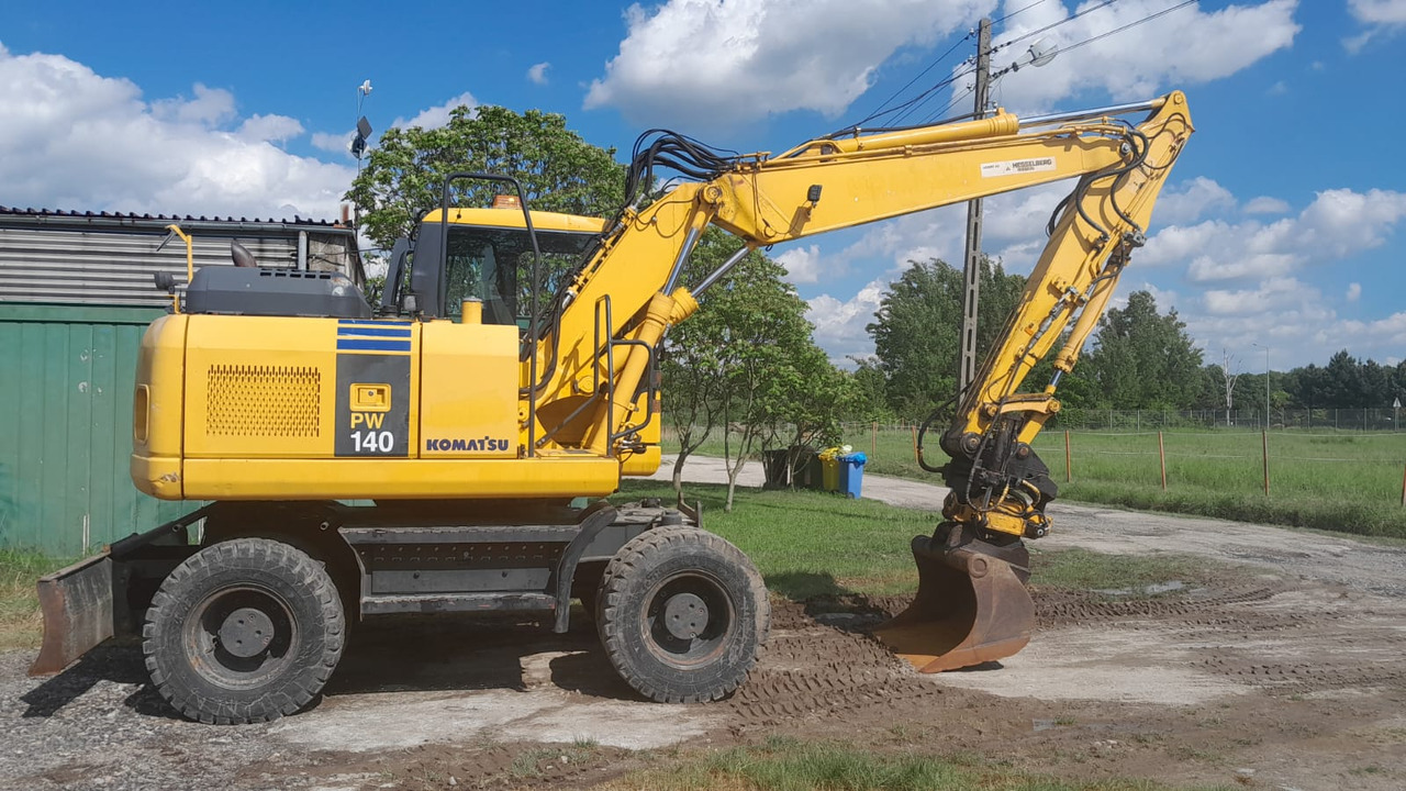 KOMATSU PW 140-7 - 轮式挖掘机:图1 KOMATSU PW 140-7 - 轮式挖掘机:图1