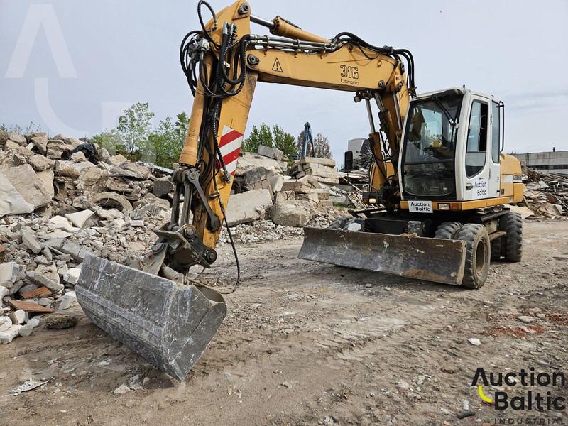 Liebherr A 316 Litronic - 轮式挖掘机:图1 Liebherr A 316 Litronic - 轮式挖掘机:图1