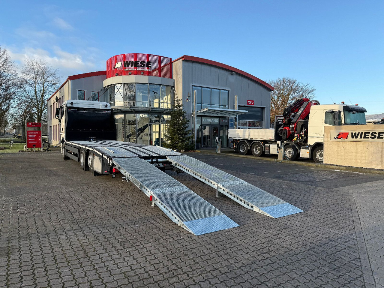 MAN Baumaschinen- Arbeitsbühnentransporter Rampen - 自动转运卡车:图1 MAN Baumaschinen- Arbeitsbühnentransporter Rampen - 自动转运卡车:图1