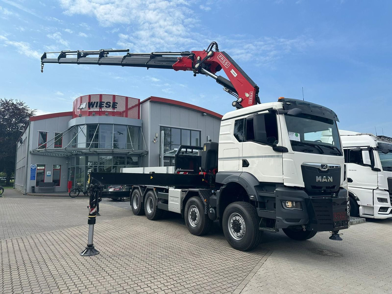 MAN TGS 41.520 8x8 mit Fassi Ladekran F710RA.2.26 - 起重车:图1 MAN TGS 41.520 8x8 mit Fassi Ladekran F710RA.2.26 - 起重车:图1