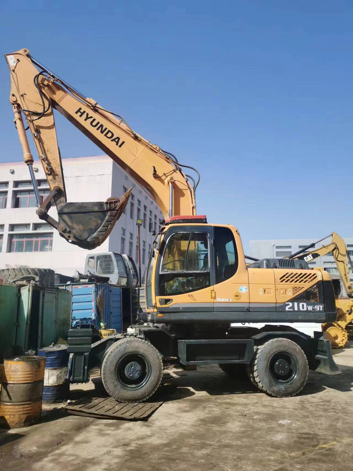 HYUNDAI 210W-9 - 轮式挖掘机:图1 HYUNDAI 210W-9 - 轮式挖掘机:图1