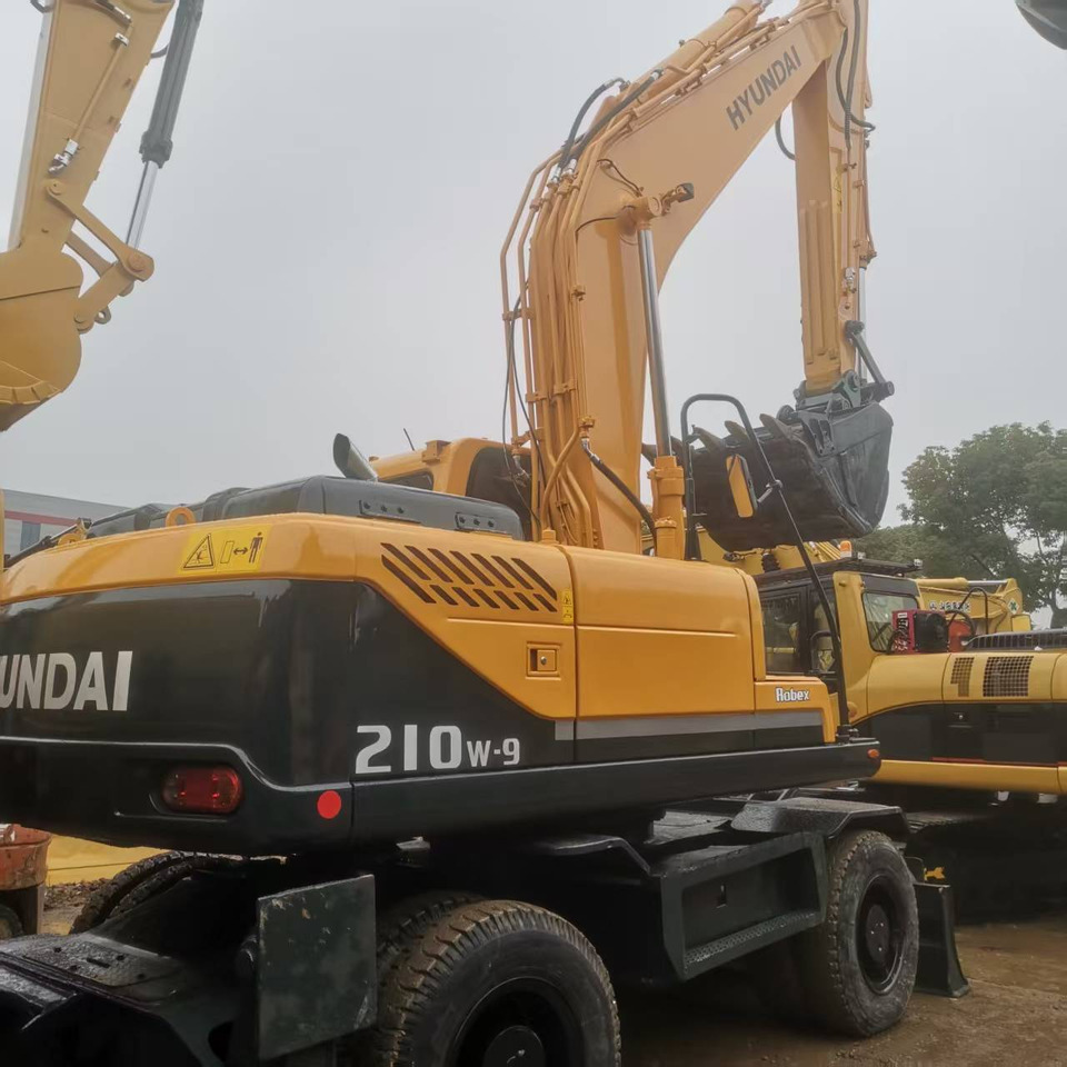 Hyundai R210W-9 - 轮式挖掘机:图5 Hyundai R210W-9 - 轮式挖掘机:图5