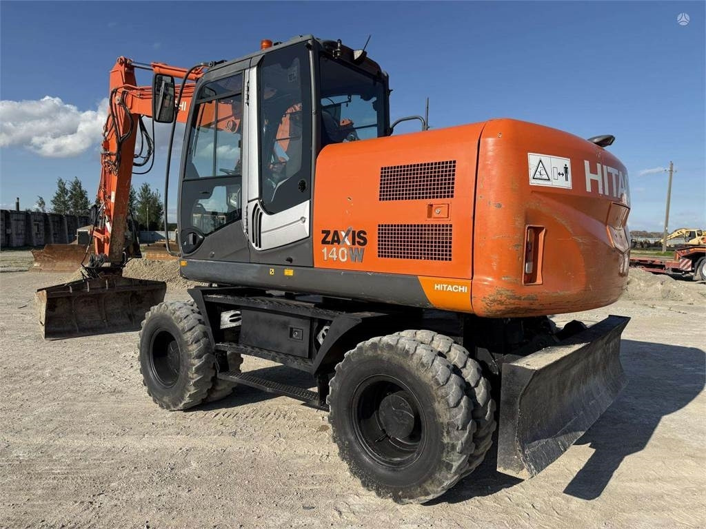 Hitachi ZX 140 W - 轮式挖掘机:图1 Hitachi ZX 140 W - 轮式挖掘机:图1