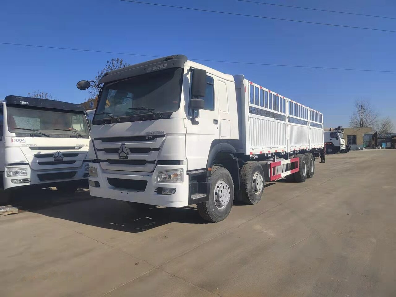 Sinotruk HOWO 8*4 Dump truck - 栏板式/ 平板卡车:图1 Sinotruk HOWO 8*4 Dump truck - 栏板式/ 平板卡车:图1