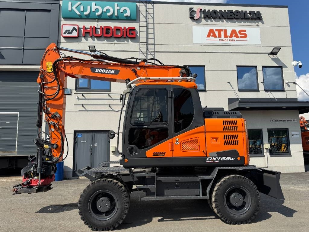 Doosan DX165W-5 PYÖRITTÄJÄLLÄ - 轮式挖掘机:图1 Doosan DX165W-5 PYÖRITTÄJÄLLÄ - 轮式挖掘机:图1