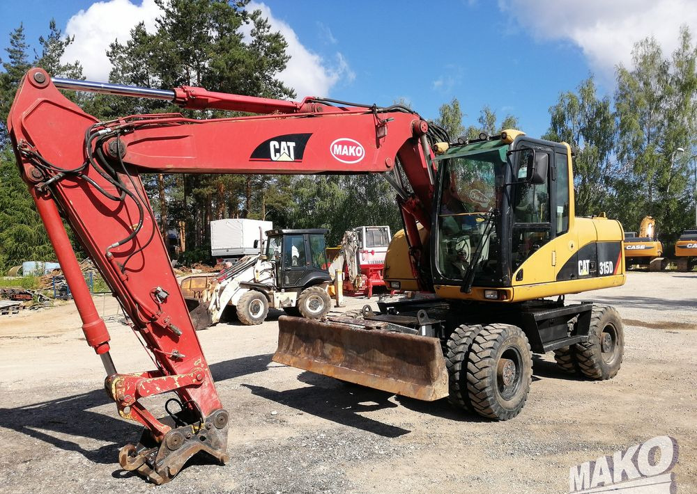 Caterpillar M315 C - 轮式挖掘机:图1 Caterpillar M315 C - 轮式挖掘机:图1