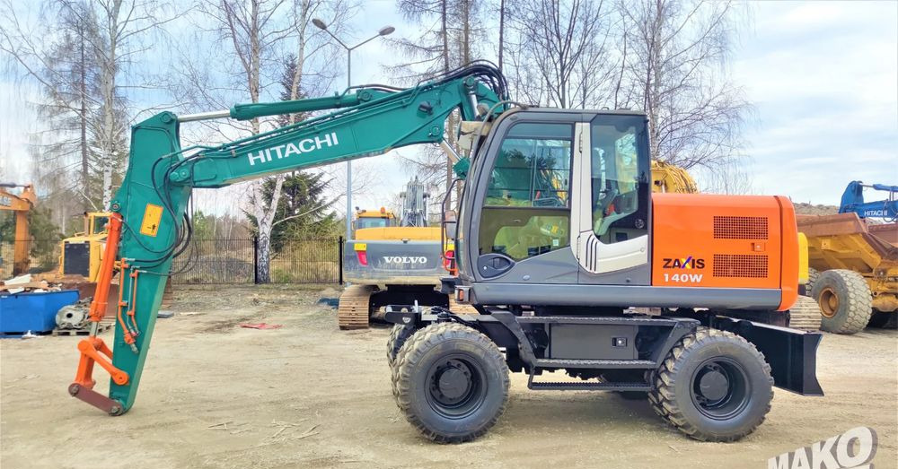 Hitachi ZX140W-3 - 轮式挖掘机:图1 Hitachi ZX140W-3 - 轮式挖掘机:图1