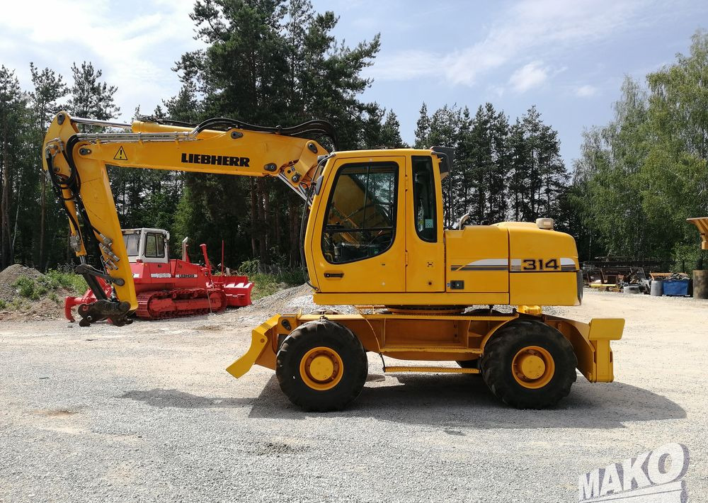 Liebherr A 314 Litronic - 轮式挖掘机:图2 Liebherr A 314 Litronic - 轮式挖掘机:图2