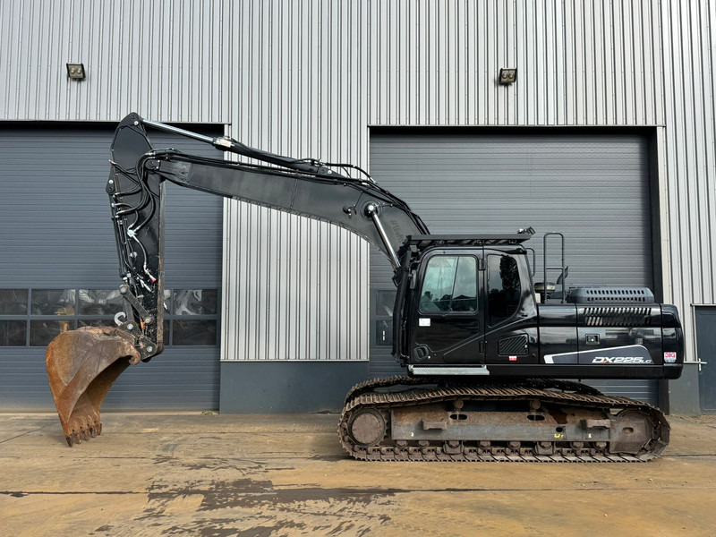 Doosan DX225LC-5 - 履带式挖掘机:图1 Doosan DX225LC-5 - 履带式挖掘机:图1