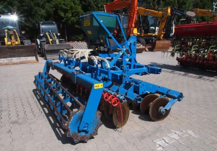 Agregat uprawowo-siewny Rabe Werk 2011 3m brona talerzowa z siewnikiem do poplonów - 联合条播机:图5 Agregat uprawowo-siewny Rabe Werk 2011 3m brona talerzowa z siewnikiem do poplonów - 联合条播机:图5