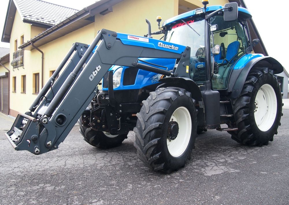 Ciągnik New Holland NH TS125A 6 cylindrów 2004 Ciągnik rolniczy New Holland TS125A - 拖拉机:图1 Ciągnik New Holland NH TS125A 6 cylindrów 2004 Ciągnik rolniczy New Holland TS125A - 拖拉机:图1