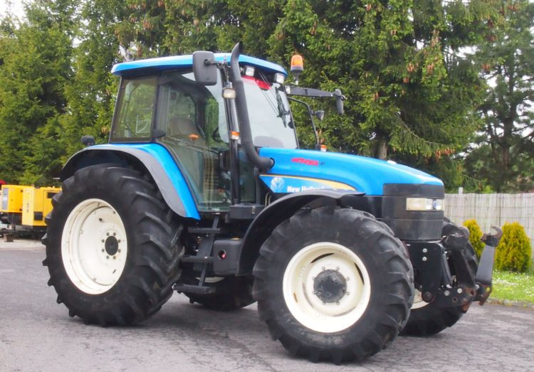 Ciągnik New Holland TM 140 2004 Przedni TUZ - 拖拉机:图1 Ciągnik New Holland TM 140 2004 Przedni TUZ - 拖拉机:图1