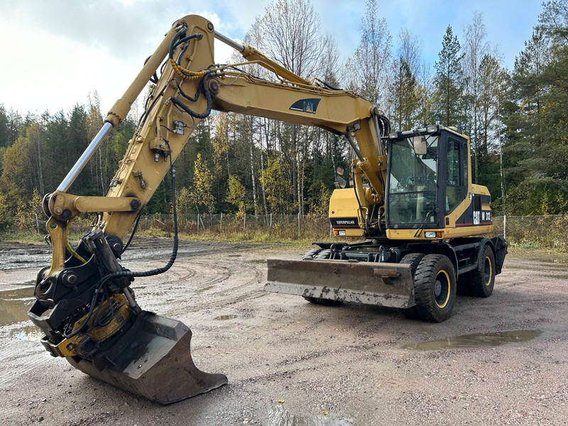 Caterpillar M312 Engcon EC20 tiltrotator - 轮式挖掘机:图1 Caterpillar M312 Engcon EC20 tiltrotator - 轮式挖掘机:图1