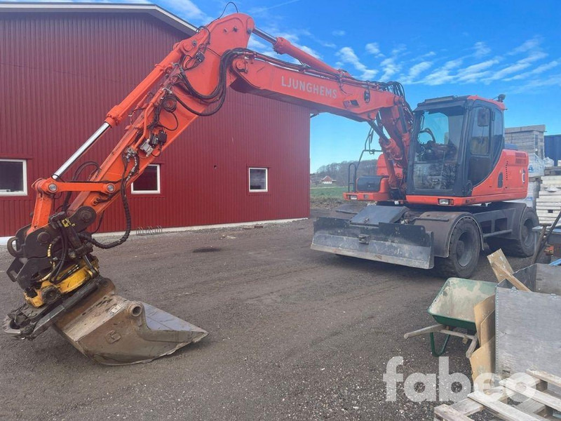 Doosan DX160W - 轮式挖掘机:图1 Doosan DX160W - 轮式挖掘机:图1