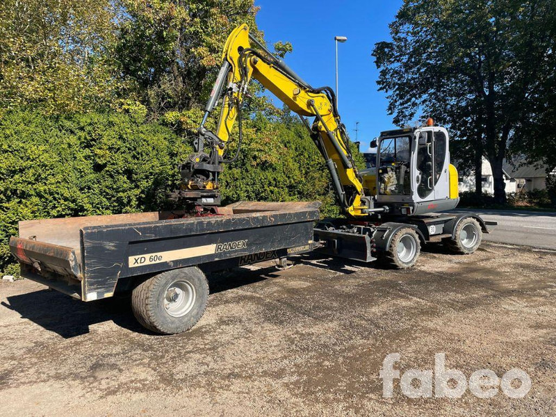 WACKER NEUSON EW100 - 轮式挖掘机:图1 WACKER NEUSON EW100 - 轮式挖掘机:图1