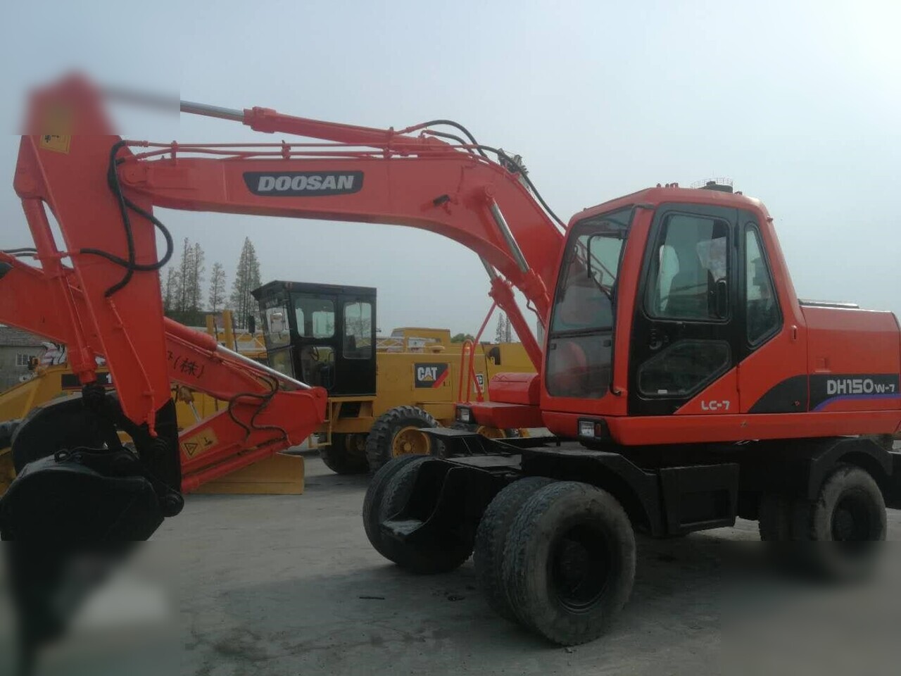 DOOSAN DH150W-7 - 轮式挖掘机:图1 DOOSAN DH150W-7 - 轮式挖掘机:图1