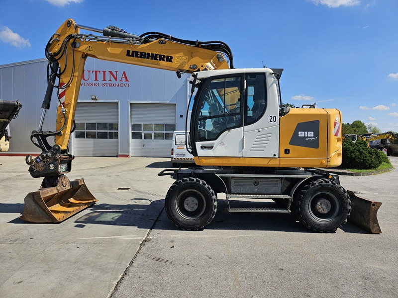 LIEBHERR A918 Compact - 轮式挖掘机:图1 LIEBHERR A918 Compact - 轮式挖掘机:图1