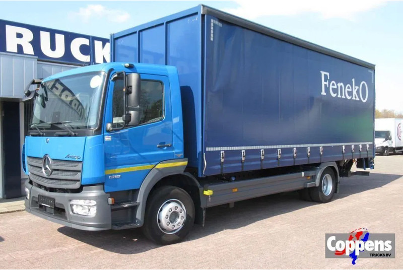 Mercedes-Benz Atego 1318L Euro 6 - 侧帘卡车:图1 Mercedes-Benz Atego 1318L Euro 6 - 侧帘卡车:图1