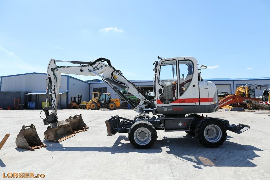 Wacker Neuson EW 100 - 轮式挖掘机:图1 Wacker Neuson EW 100 - 轮式挖掘机:图1