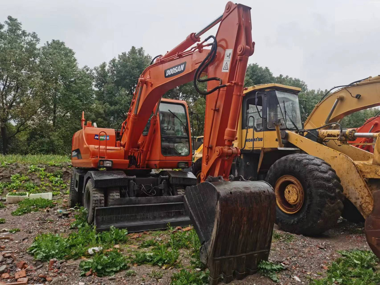 DOOSAN DH150W-7 - 轮式挖掘机:图1 DOOSAN DH150W-7 - 轮式挖掘机:图1