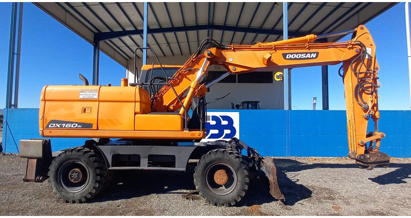 Doosan DX140W-3 - 轮式挖掘机:图2 Doosan DX140W-3 - 轮式挖掘机:图2