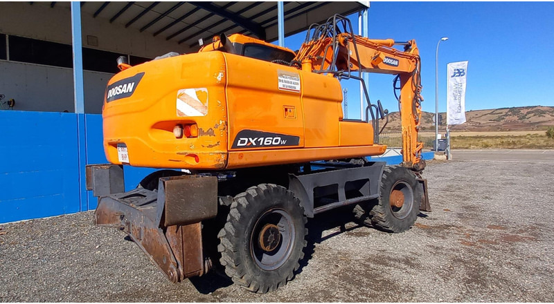 Doosan DX140W-3 - 轮式挖掘机:图4 Doosan DX140W-3 - 轮式挖掘机:图4