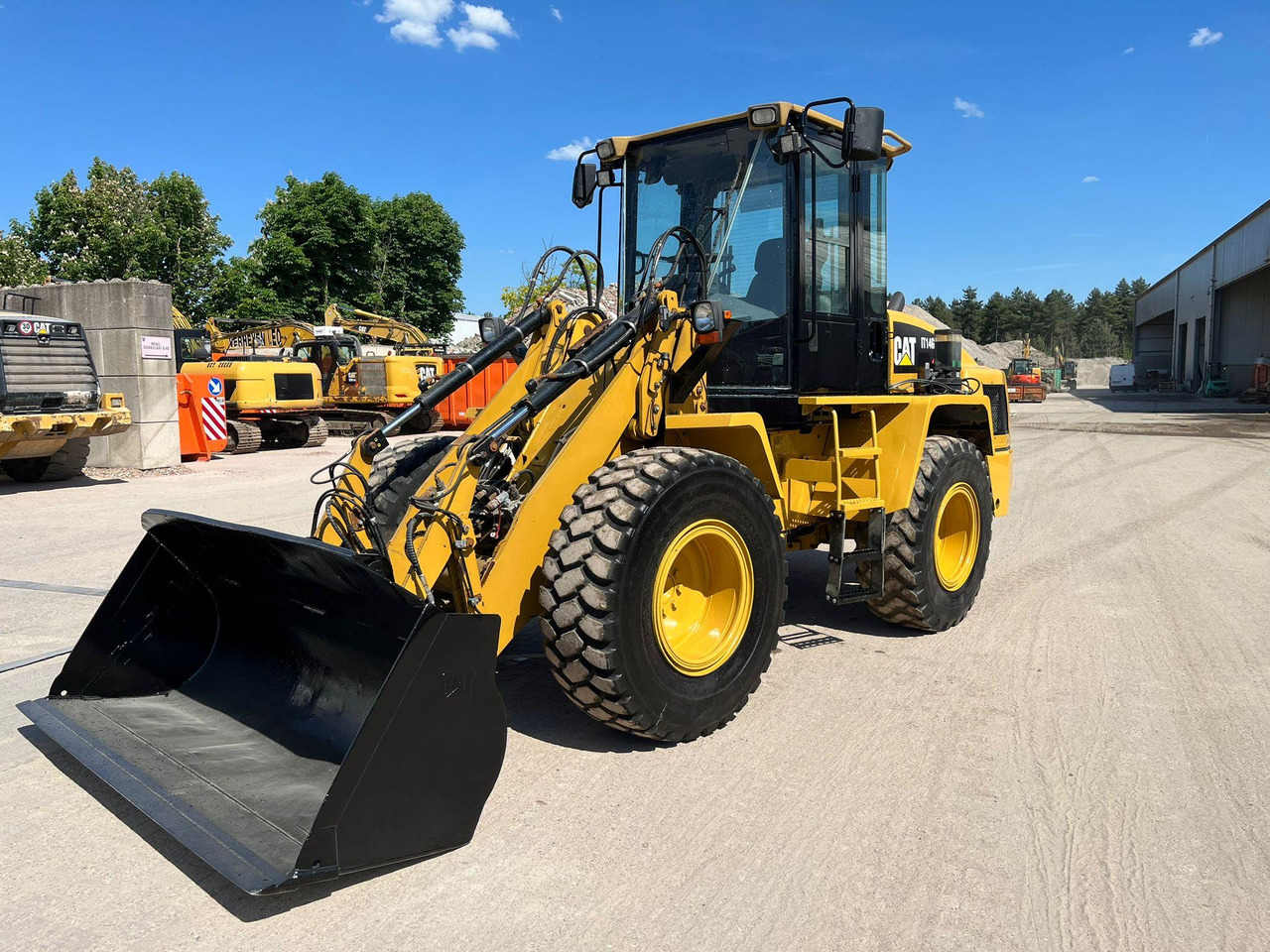 Caterpillar IT 14G - 轮式装载机:图1 Caterpillar IT 14G - 轮式装载机:图1