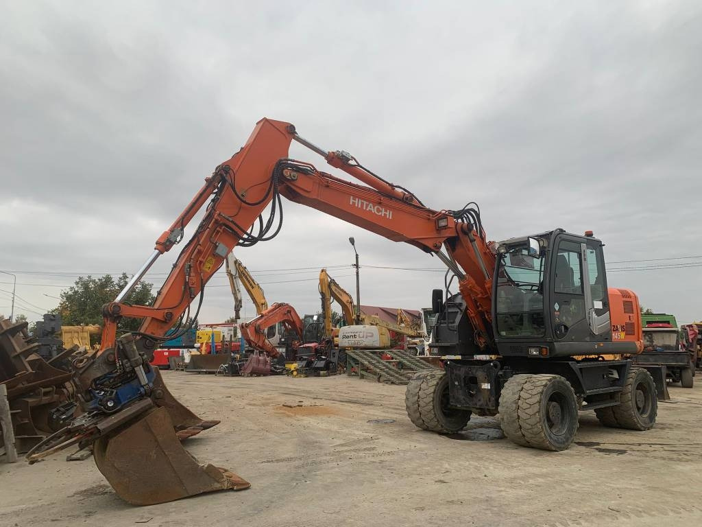 Hitachi ZX 145 W-3+SMP Rototilt  - 轮式挖掘机:图1 Hitachi ZX 145 W-3+SMP Rototilt  - 轮式挖掘机:图1