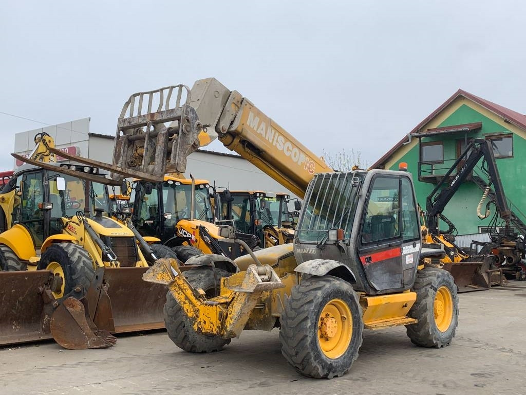 Manitou MT 1233 S - 伸缩臂叉装车:图1 Manitou MT 1233 S - 伸缩臂叉装车:图1