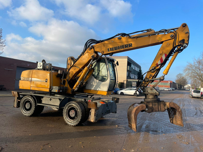 Liebherr A 316 - 轮式挖掘机:图1 Liebherr A 316 - 轮式挖掘机:图1