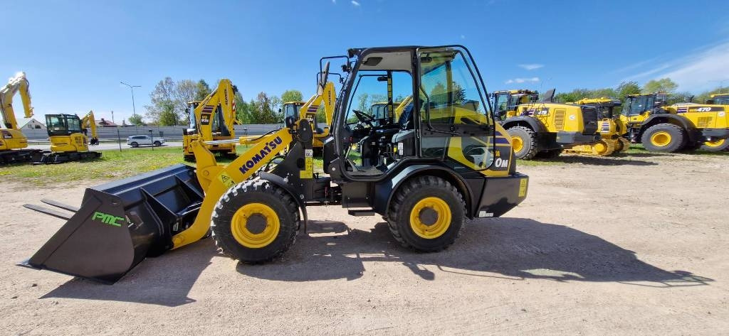 Komatsu WA 70 - 轮式装载机:图1 Komatsu WA 70 - 轮式装载机:图1