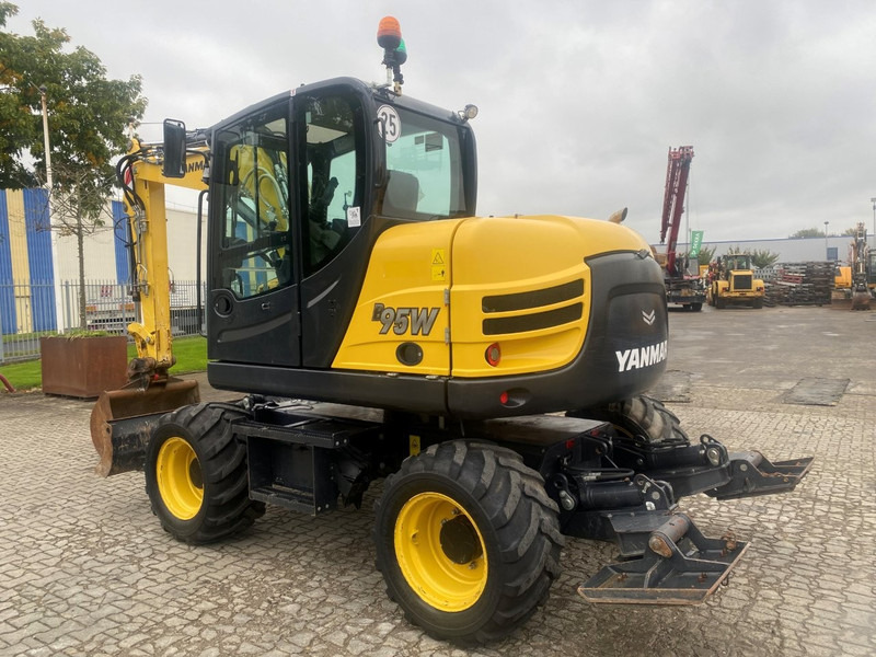 Yanmar B95w NVT - 轮式挖掘机:图2 Yanmar B95w NVT - 轮式挖掘机:图2