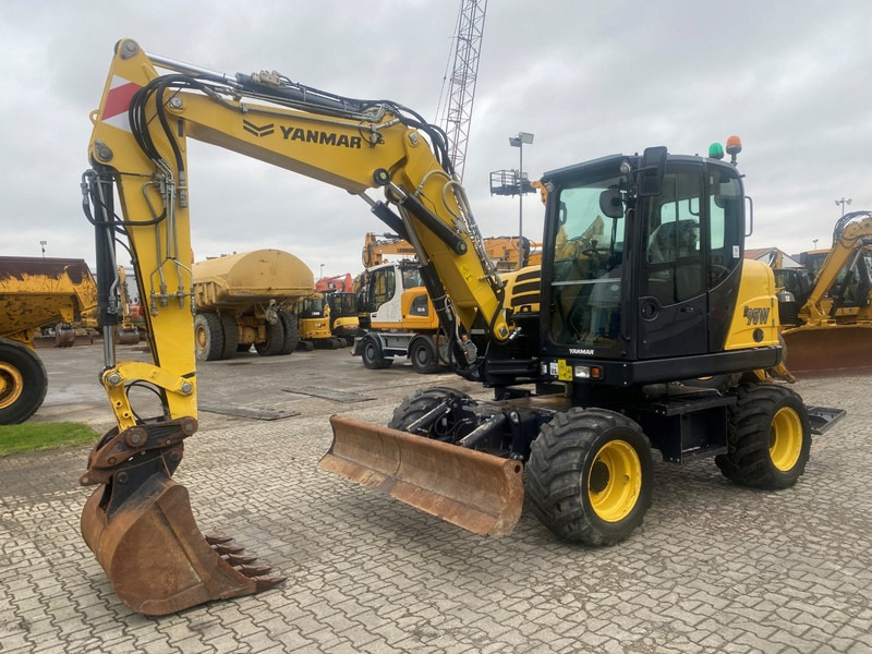Yanmar B95w NVT - 轮式挖掘机:图3 Yanmar B95w NVT - 轮式挖掘机:图3