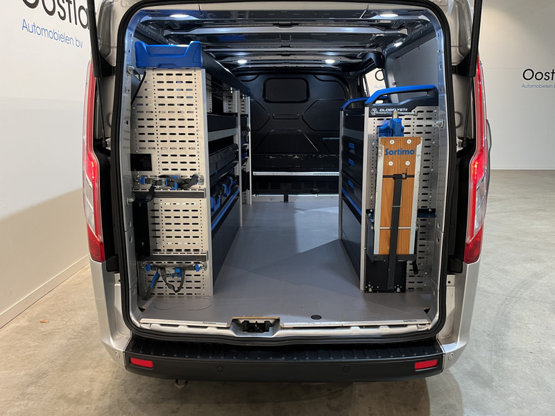 Ford Transit Custom 300 2.0 TDCI L2H1 Trend 130 PK Servicebus / Sortimo Inrichting / Euro 6 / Airco / Cruise Control / Klep / PDC / 3-Zits - 紧凑型面包车:图4 Ford Transit Custom 300 2.0 TDCI L2H1 Trend 130 PK Servicebus / Sortimo Inrichting / Euro 6 / Airco / Cruise Control / Klep / PDC / 3-Zits - 紧凑型面包车:图4