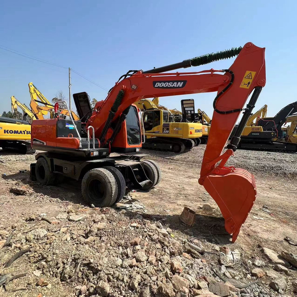 DOOSAN DH150W-7 - 轮式挖掘机:图1 DOOSAN DH150W-7 - 轮式挖掘机:图1