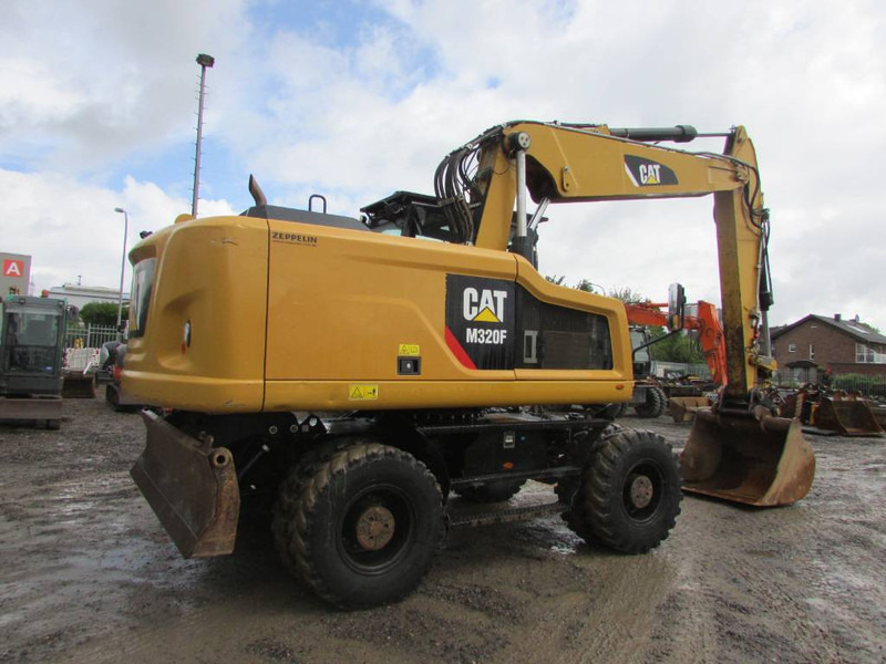 Cat M 320 F Mobilbagger 69.500 EUR / AC - 轮式挖掘机:图5 Cat M 320 F Mobilbagger 69.500 EUR / AC - 轮式挖掘机:图5