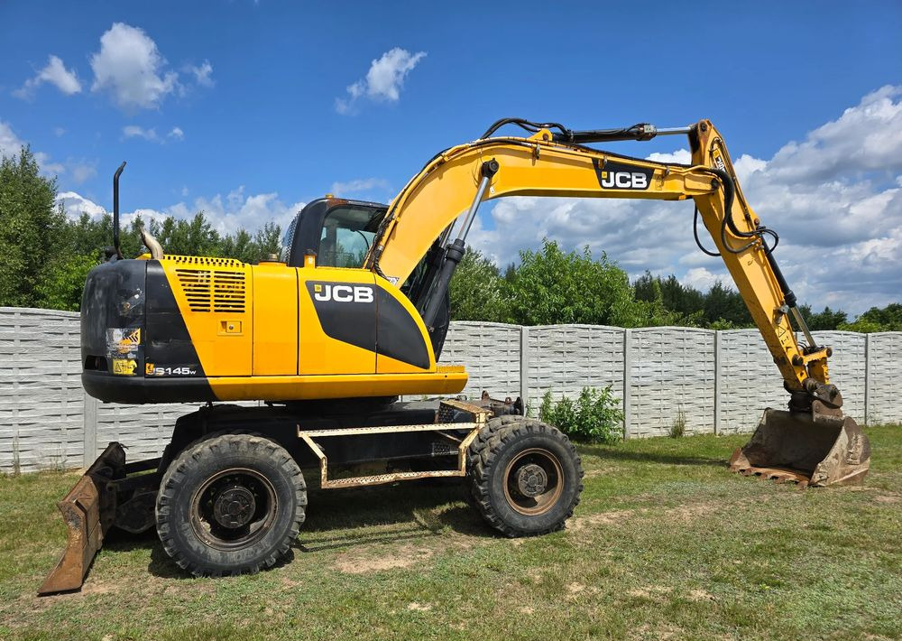 JCB - 轮式挖掘机:图2 JCB - 轮式挖掘机:图2