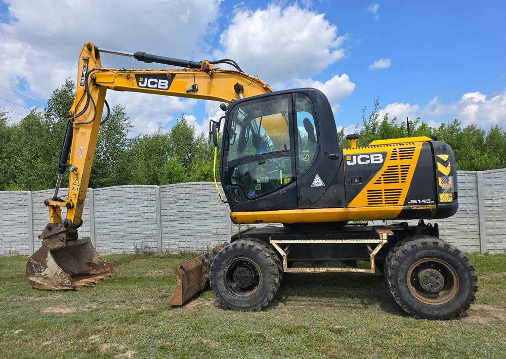JCB - 轮式挖掘机:图1 JCB - 轮式挖掘机:图1
