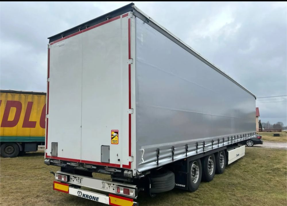 Krone STANDARD NAUKA JAZDY 2x podnoszona oś 2021 podnoszona oś OPONY 70% / STAN BARDZO DOBRY / OD PIERWSZEGO WŁAŚCICIELA / PALECIARA / TOP / sprowadzona z Niemiec !! - 侧帘半拖车:图1 Krone STANDARD NAUKA JAZDY 2x podnoszona oś 2021 podnoszona oś OPONY 70% / STAN BARDZO DOBRY / OD PIERWSZEGO WŁAŚCICIELA / PALECIARA / TOP / sprowadzona z Niemiec !! - 侧帘半拖车:图1