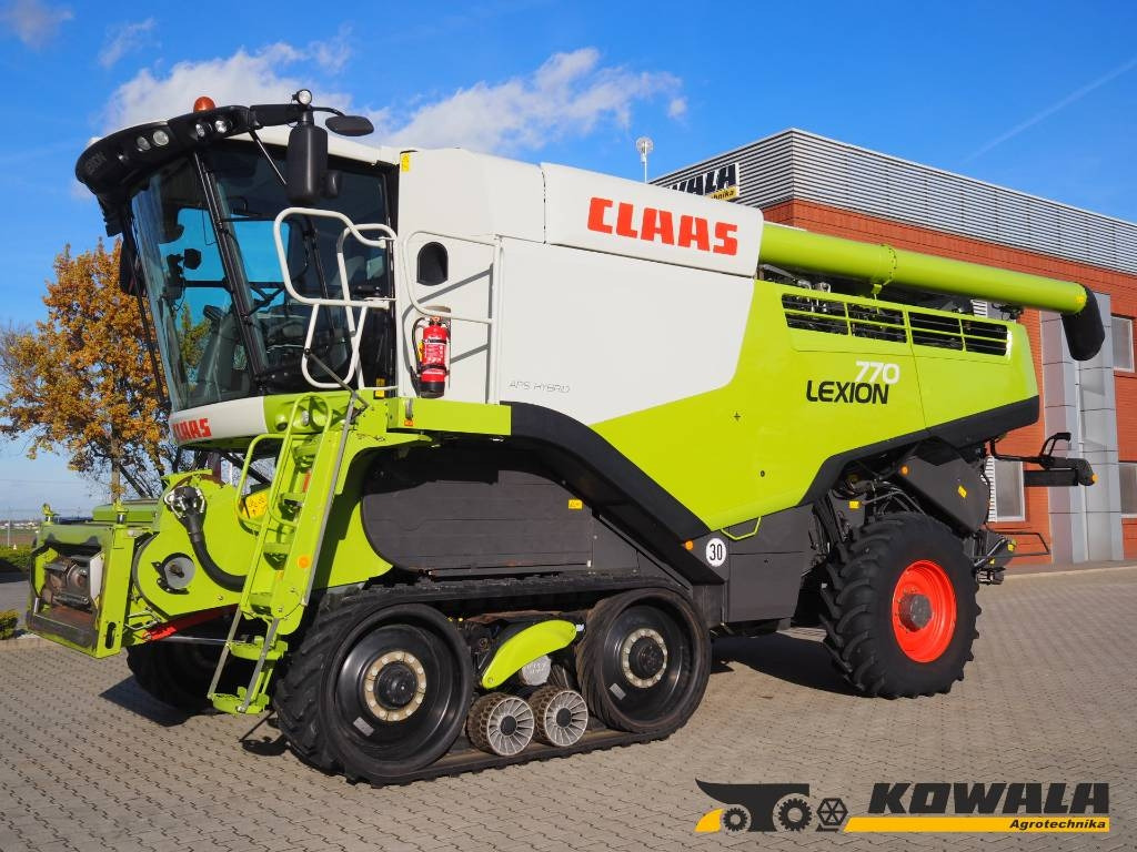 Claas Lexion 770TT 4x4 + V1200  - 联合收割机:图1 Claas Lexion 770TT 4x4 + V1200  - 联合收割机:图1
